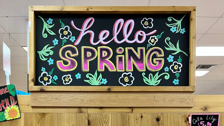 Trader Joe's chalkboard sign reading, 
