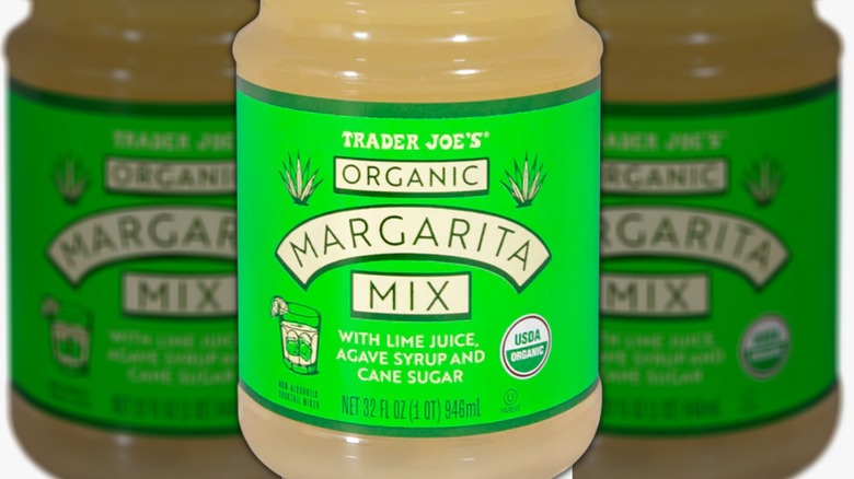 Bottle of margarita mix with green label with white lettering