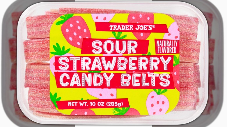 Package of Trader Joe's Sour Strawberry Candy Belts with white lettering on red and yellow background