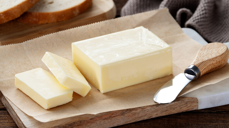 Butter on a wooden cutting board