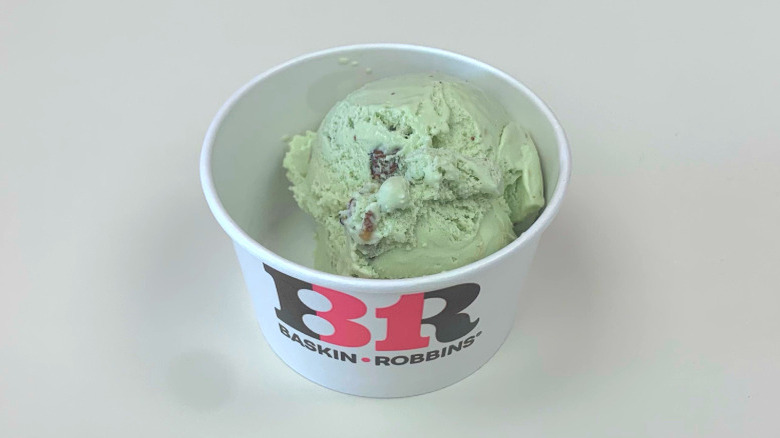 A cup of Baskin-Robbins pistachio almond ice cream