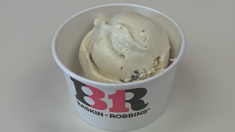 a cup of Baskin-Robbins Old Fashioned Butter Pecan ice cream