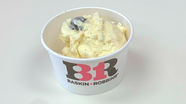 a cup of Baskin-Robbins Caramel Turtle Truffle ice cream