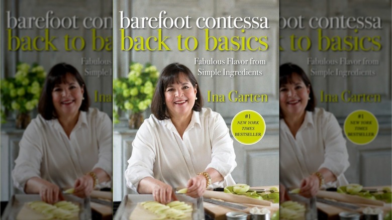 Book cover showing Ina Garten in a white blouse preparing a pastry with apple slices