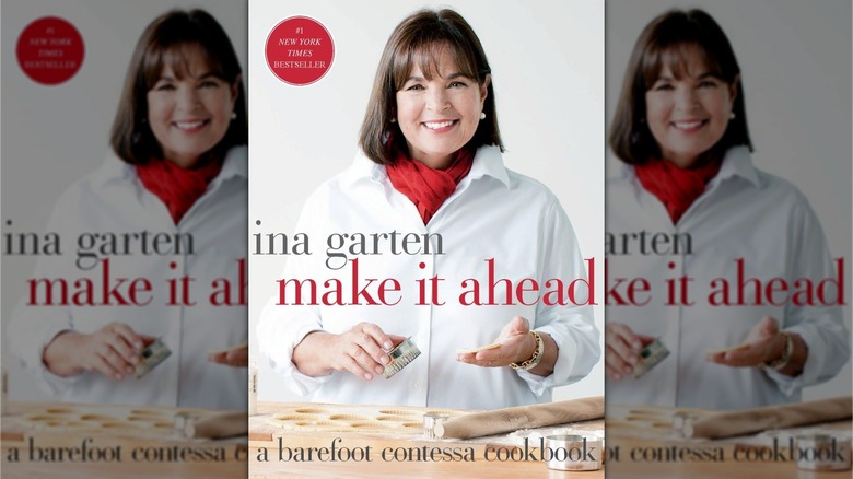 Book cover for Make It Ahead, showing Ina Garten in a white blouse and red scarf, holding a cookie cutter