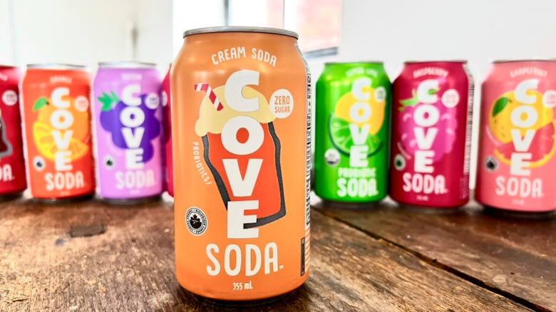 Row of Cove sodas with Cream Soda flavor in the front