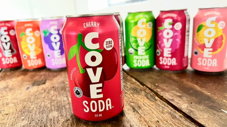 Row of Cove sodas with Cherry flavor in the front