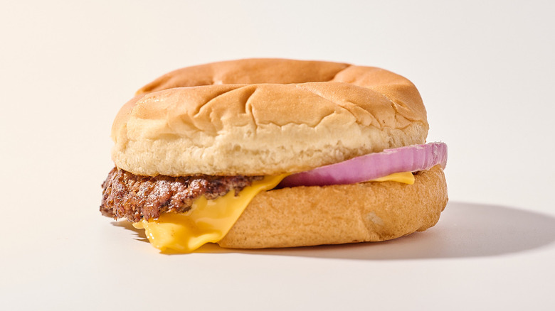 Butterburger with onion on a table