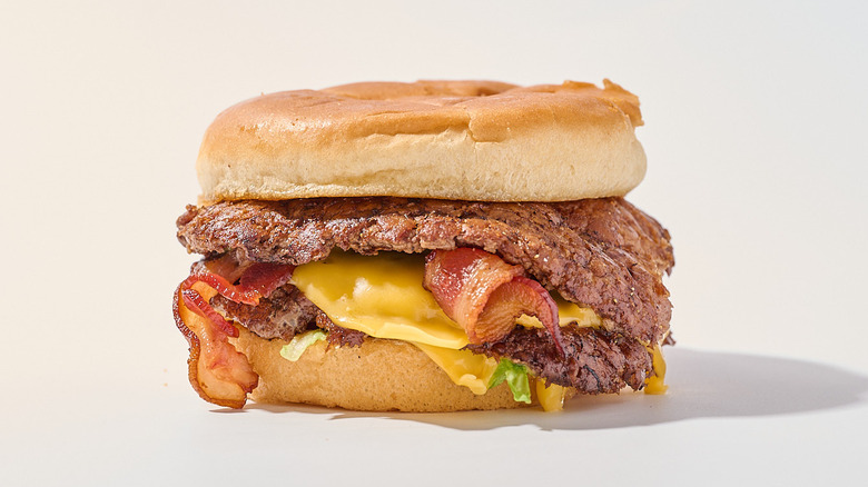 Double bacon cheeseburger on a table