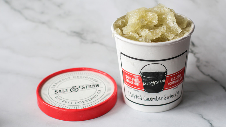 Pickled cucumber sorbet pint on a marbled surface