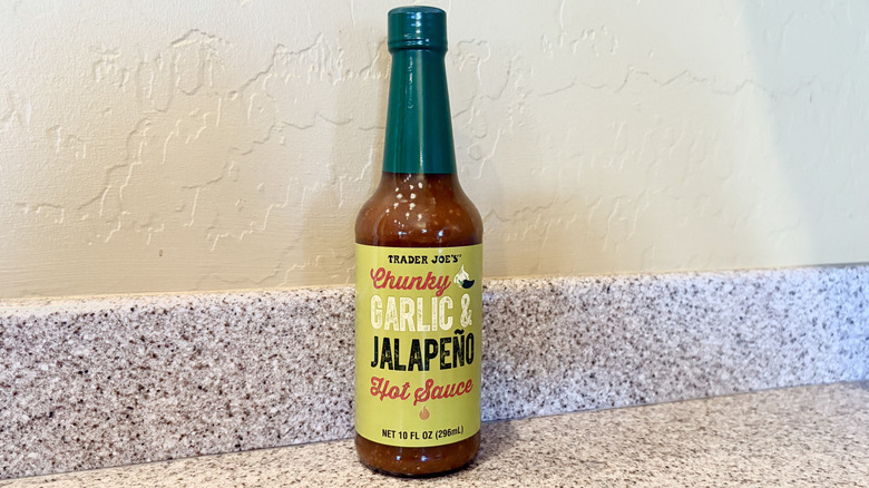 Trader Joe's Chunky Garlic & Jalapeño Hot Sauce on a counter