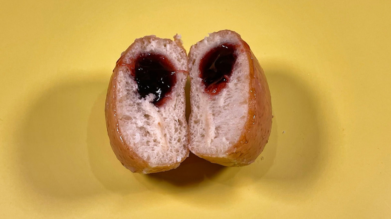 The original glazed raspberry filled donut from Krispy Kreme
