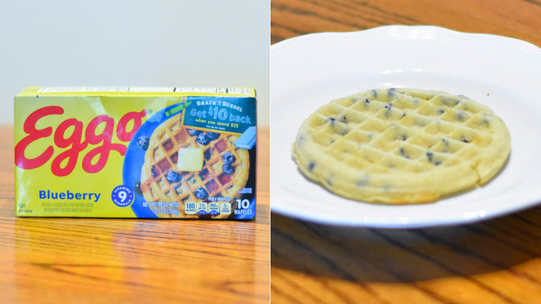 A box of Eggo blueberry waffles next to a waffle on a white plate