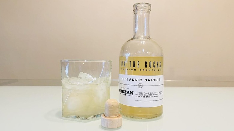 Bottle and glass of On The Rocks Classic Daquiri