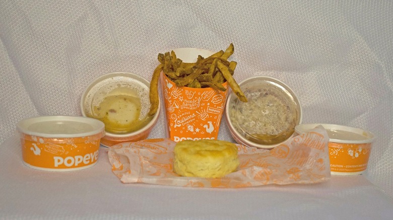 A collection of five sides from Popeye's against a white background.