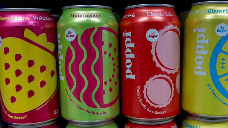 Stack of Poppi Soda cans