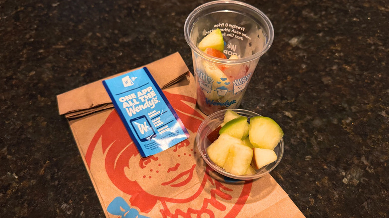 bowl and cup of Wendy's Apple Bites placed on to-go baggie