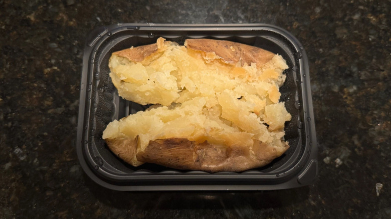 Wendy's Plain Baked Potato in black to-go container