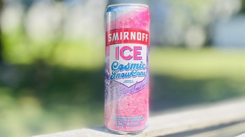 Can of Smirnoff Ice Cosmic Snow Cone on outdoor deck