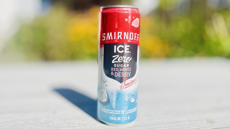 Can of Smirnoff Ice Zero Sugar Red, White & Berry on outdoor deck