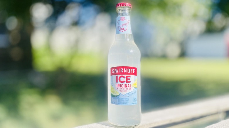 Bottle of Smirnoff Ice Original on outdoor deck