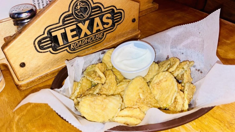 Texas Roadhouse Fried Pickles appetizer is shown.