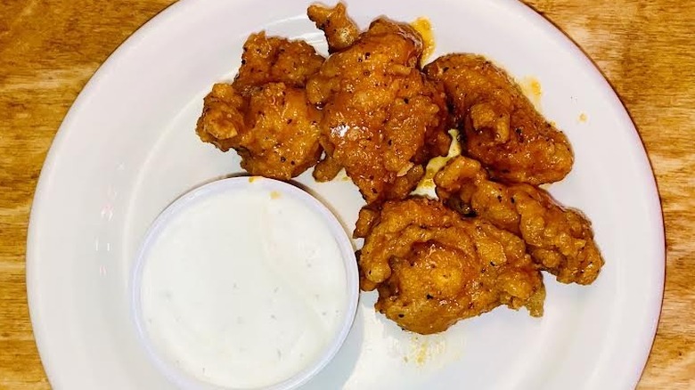 Texas Roadhouse Boneless Buffalo Wings appetizer is shown.