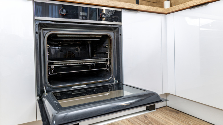 A clean oven with its door open