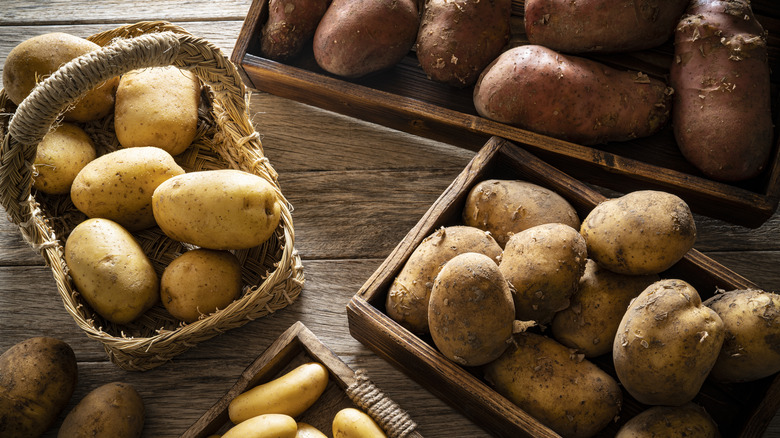 Baskets and boxes of potatoes