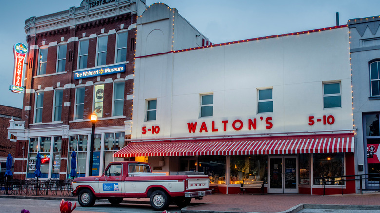 Exterior of the Walmart Museum building with the old "Walton's" logo