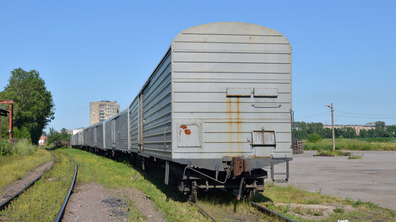 Refrigerated train car on a track
