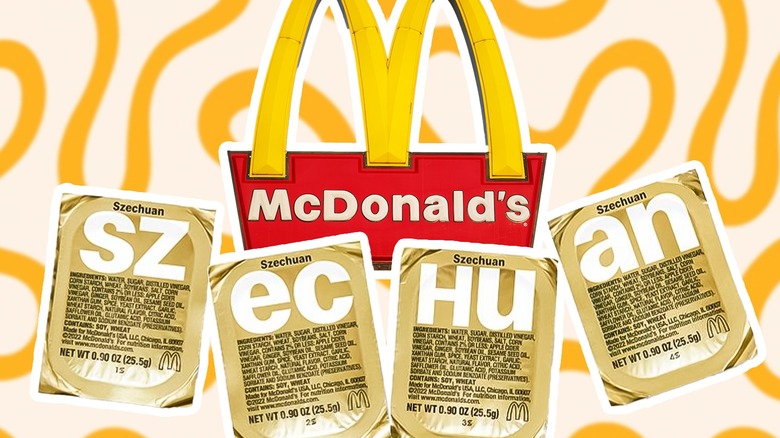 Four packets of McDonald's Szechuan sauce with McDonald's sign