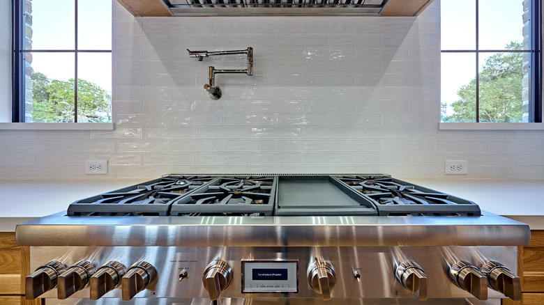 pot filler above stovetop