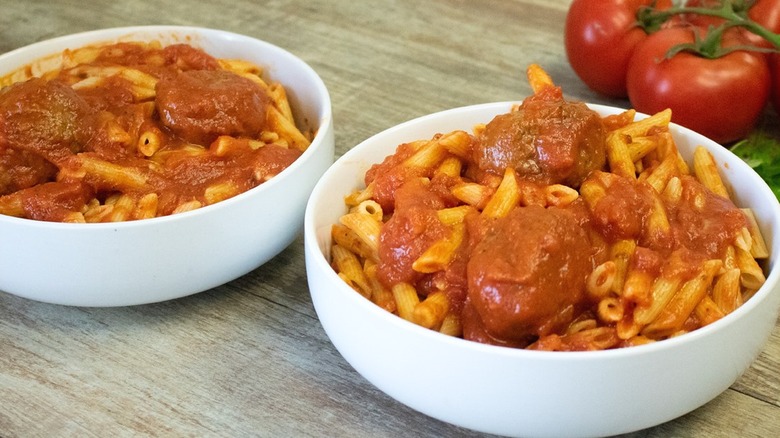 Spaghetti and meatballs in bowls