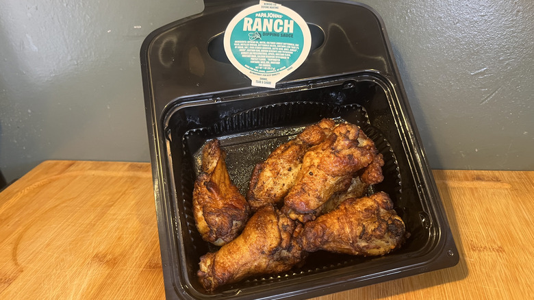 Papa Johns Oven-Baked Wings in a container