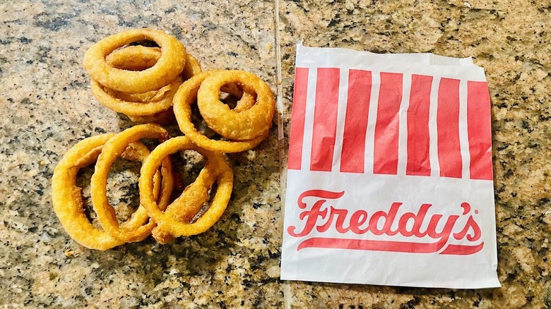 Order of Freddy's Onion Rings on marble counter
