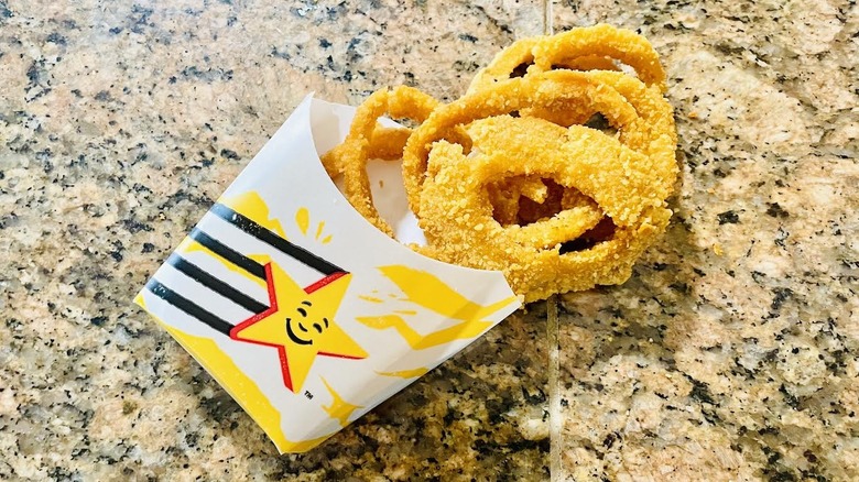 An order of Carl's Jr. Onion Rings on marble counter