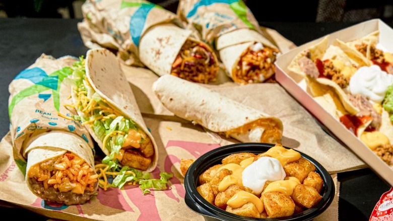 Various offerings from Taco Bell Luxe Value menu, including Fiesta potato taco and various burritos