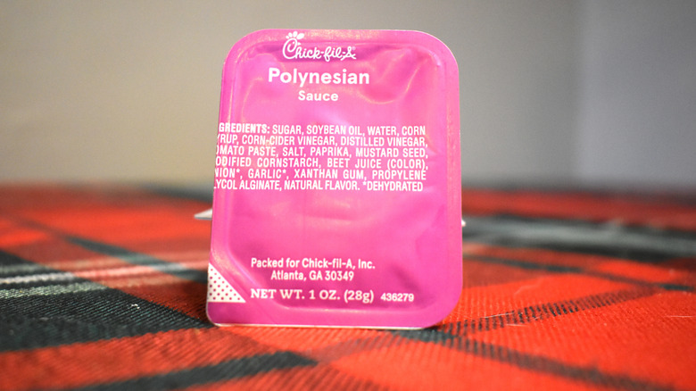pink container of polynesian sauce
