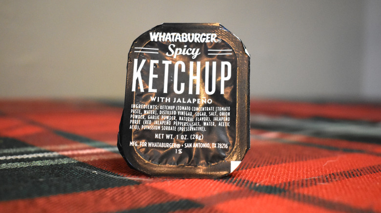 black and white package of spicy ketchup