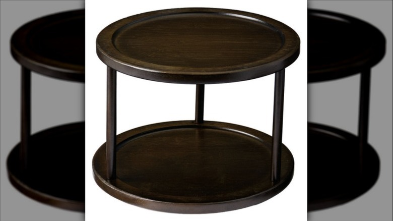 Two-tiered bamboo turntable organizer.