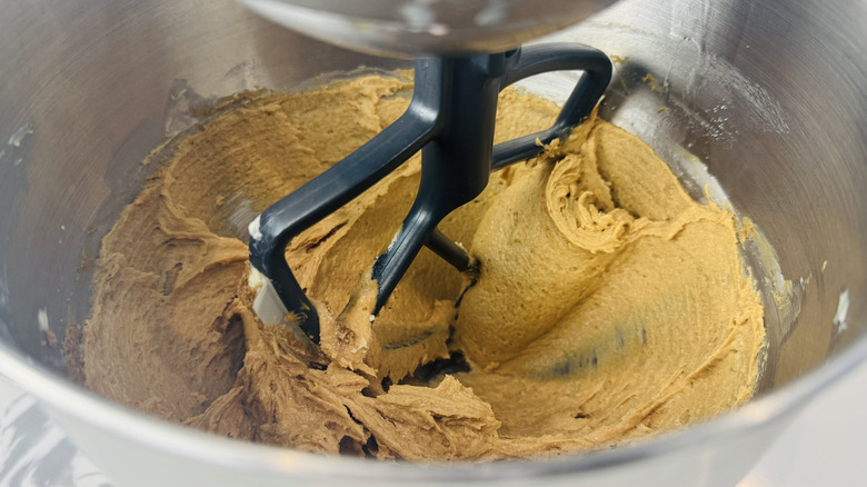 Cookie dough mixing in stand mixer bowl