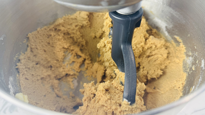 Peanut butter cookie dough in mixing bowl