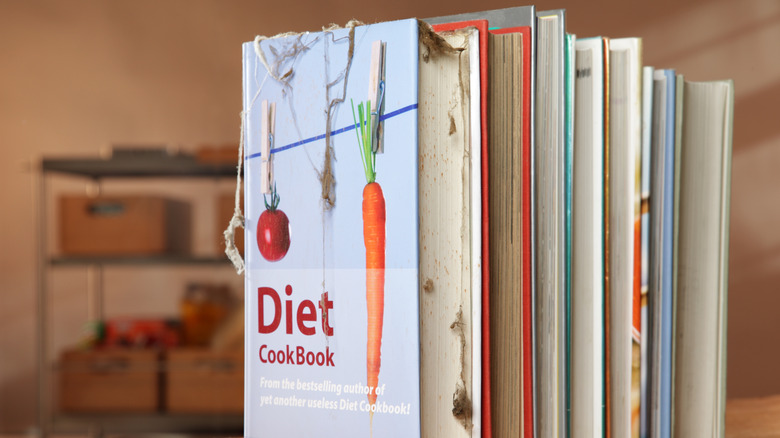 cookbooks stored vertically