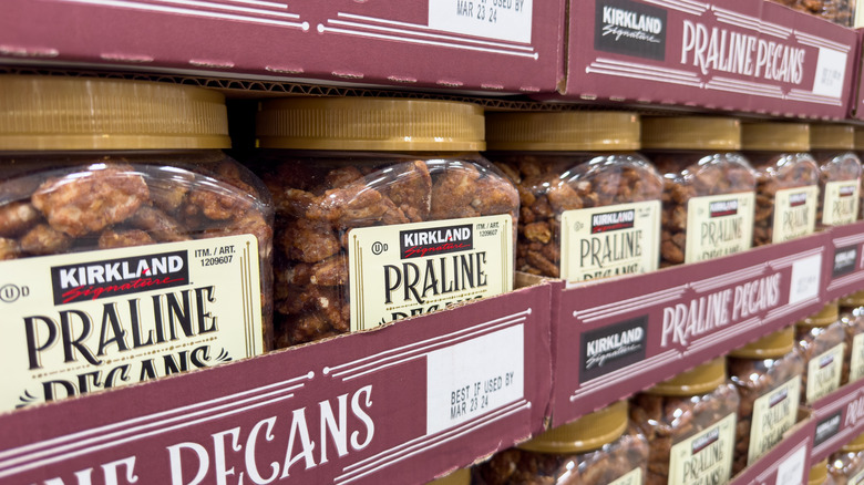 Jars of Kirkland Signature Praline Pecans at a Costco warehouse