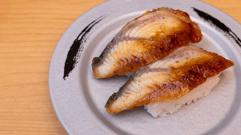 unagi nigiri on white plate