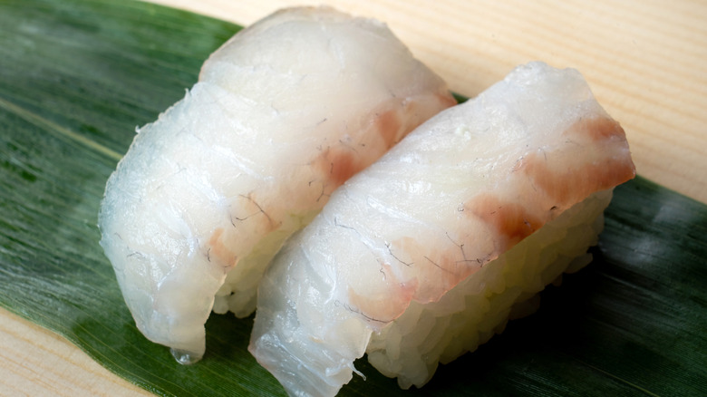 red snapper nigiri on leaf