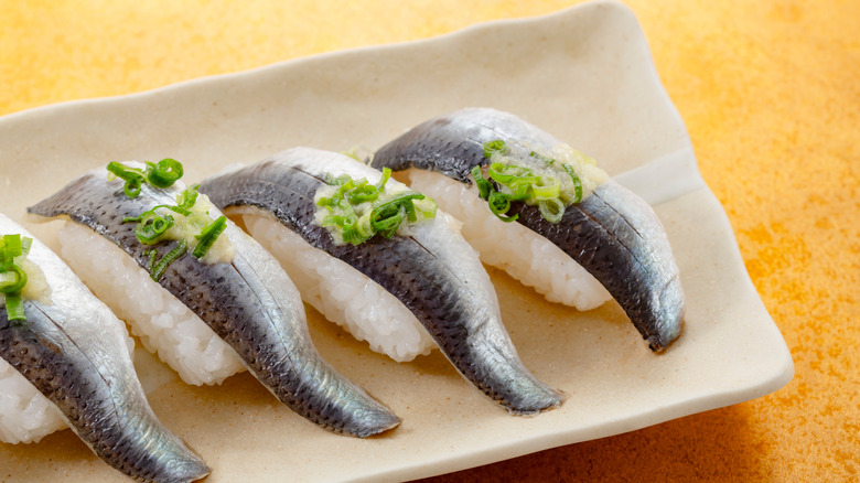 sardine nigiri with scallions