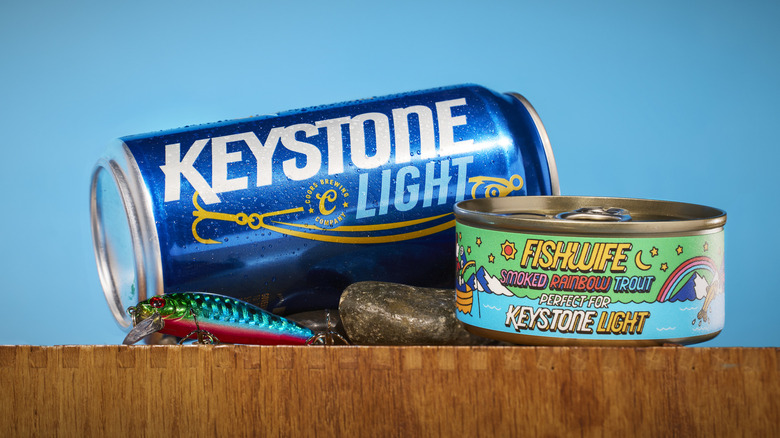 Keystone Light can and Fishwife trout tin