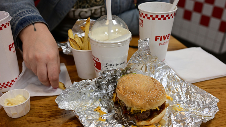 A burger, fries, and drinks from Five Guys